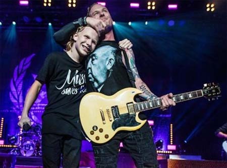 A picture of Corey Taylor and his son.